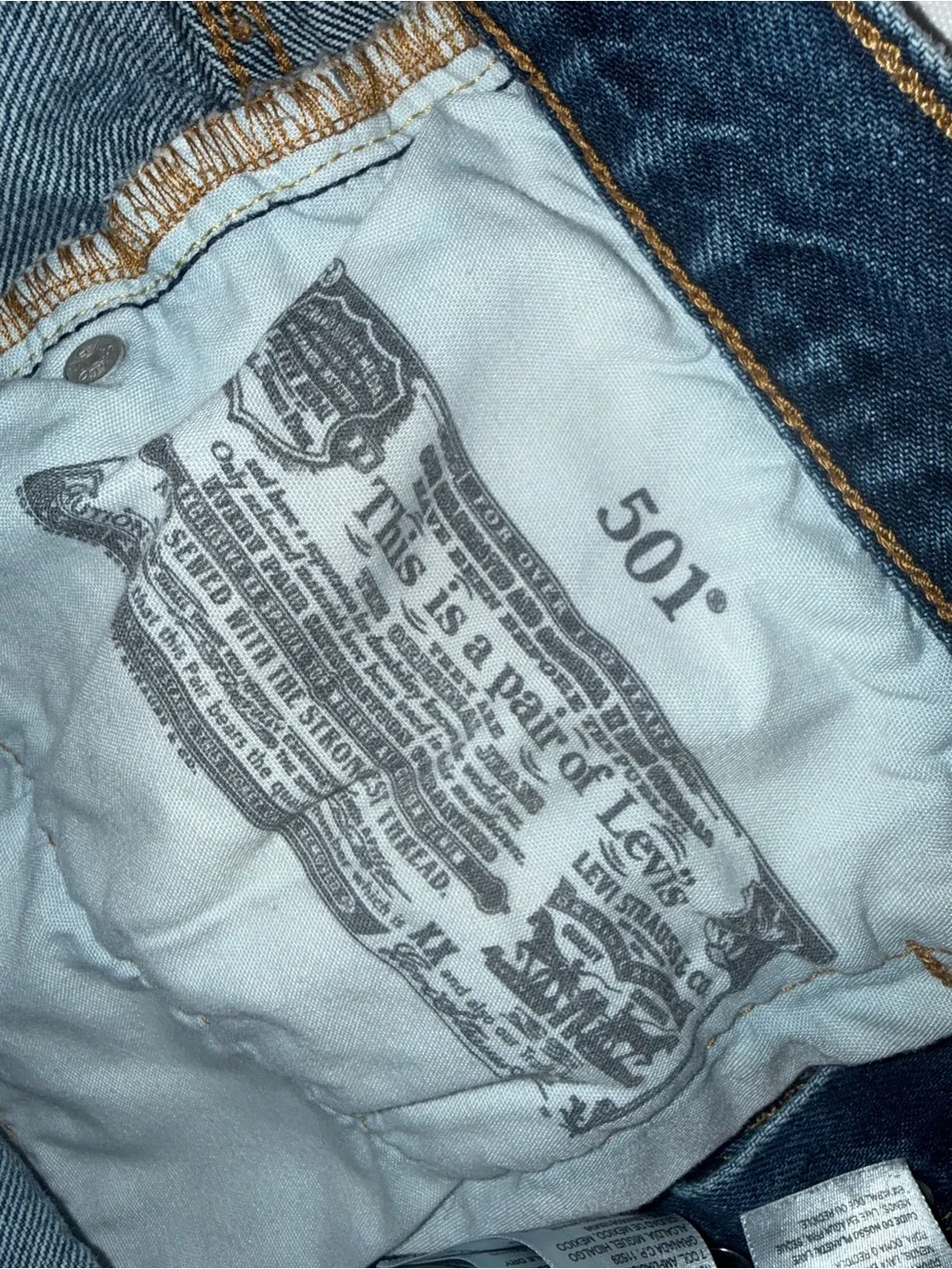 Levi's Light Blue Ripped Denim Cutoff Shorts